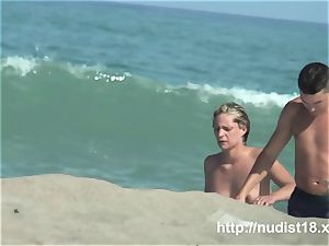 bare beach voyeur shoots a molten honey with a hidden webcam